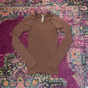 long sleeve Lululemon swiftly tech shirt.